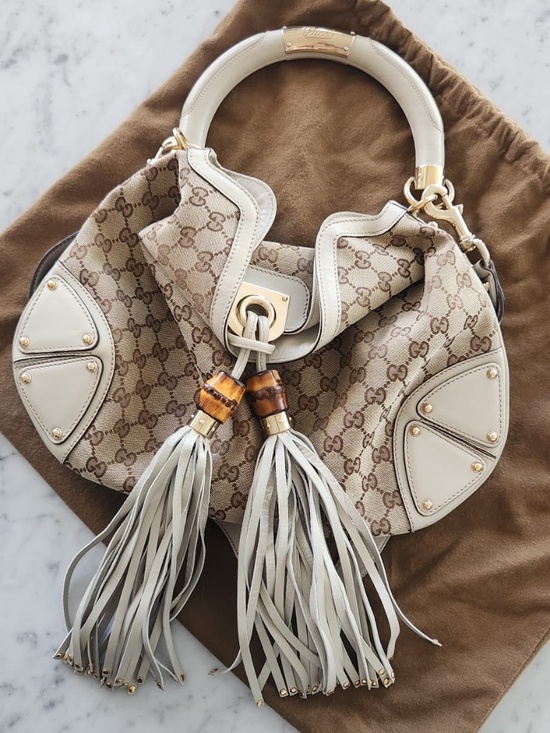 Gucci Handbags - Gucci beige monogram Indy bag
